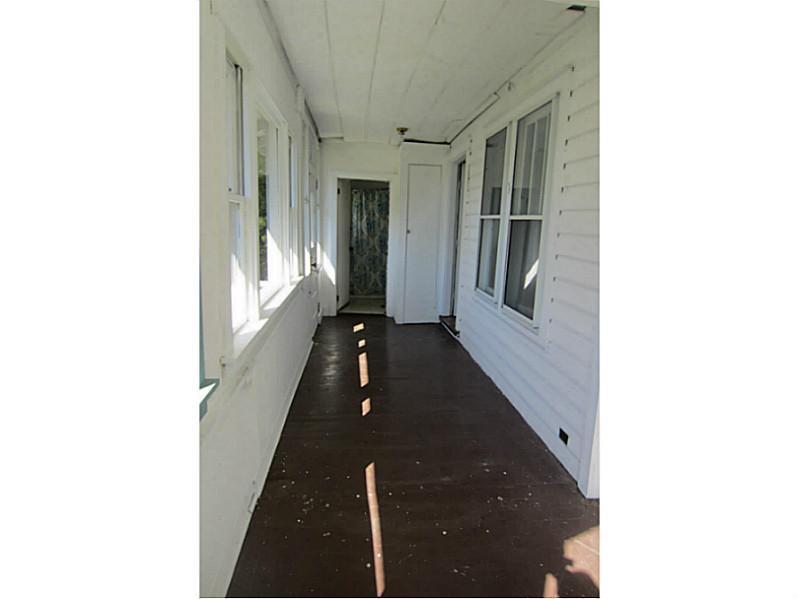 16 Keen Way Georgetown, ME 04548 - Photo 30 of 35 Enclosed Porch. The full bath is at...