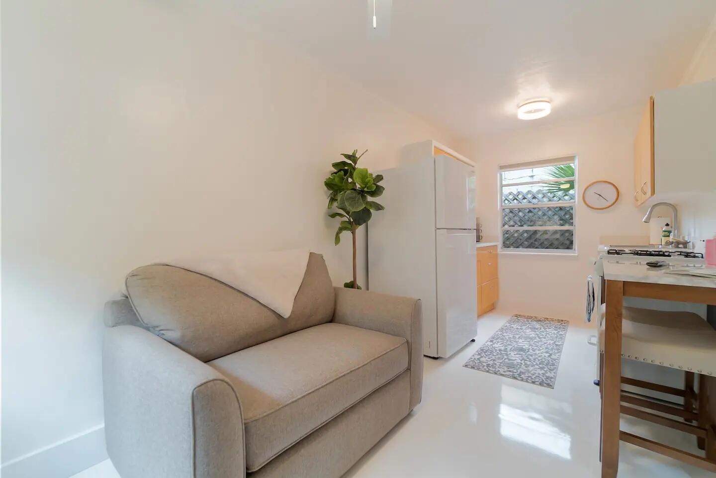 321 Malverne Road West Palm Beach, FL 33405 - Photo 14 of 17 a living room with furniture and a potted plant