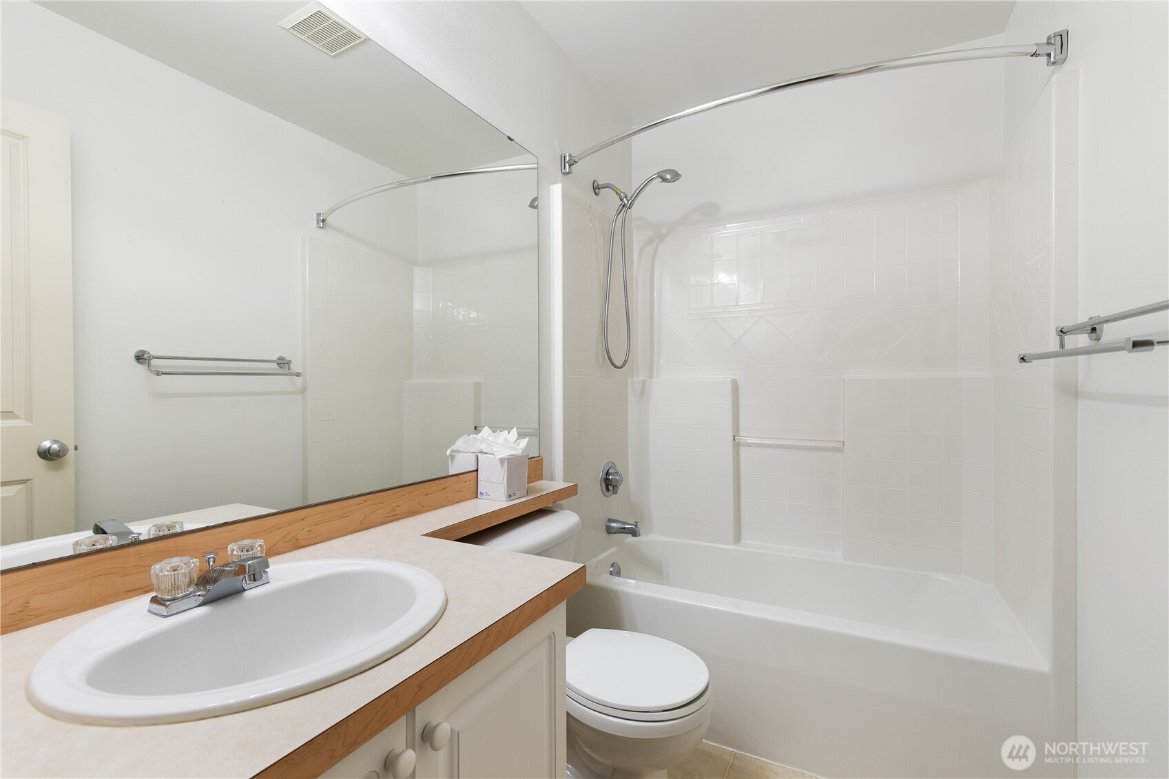 22607 42nd Place South, Unit 13 Kent, WA 98032 - Photo 13 of 19 a bathroom with a sink toilet and shower