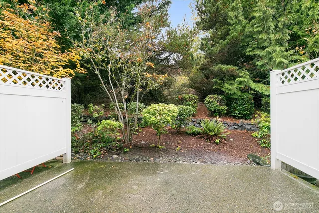 a view of a house with a tree