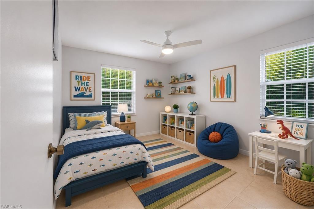 5737 Whitaker Road, Unit C101 Naples, FL 34112 - Photo 7 of 28 a bedroom with furniture and a window