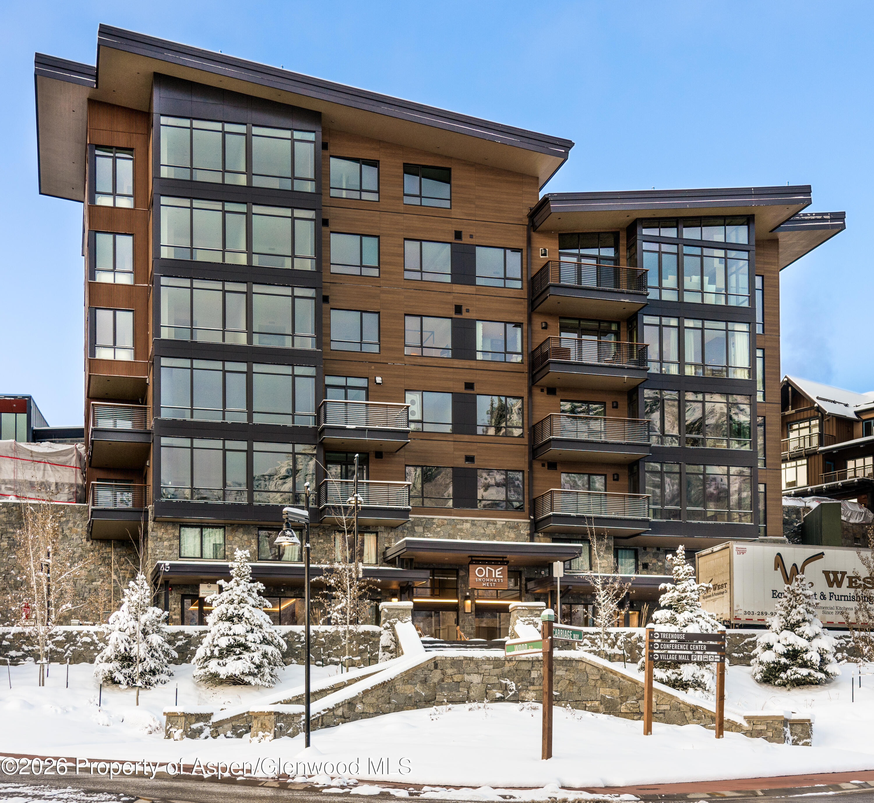 77 Wood Road, Unit 50711 Snowmass Village, CO 81615 - Photo 19 of 20 a picture of a building with a street