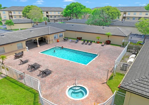 an aerial view of a house with outdoor space