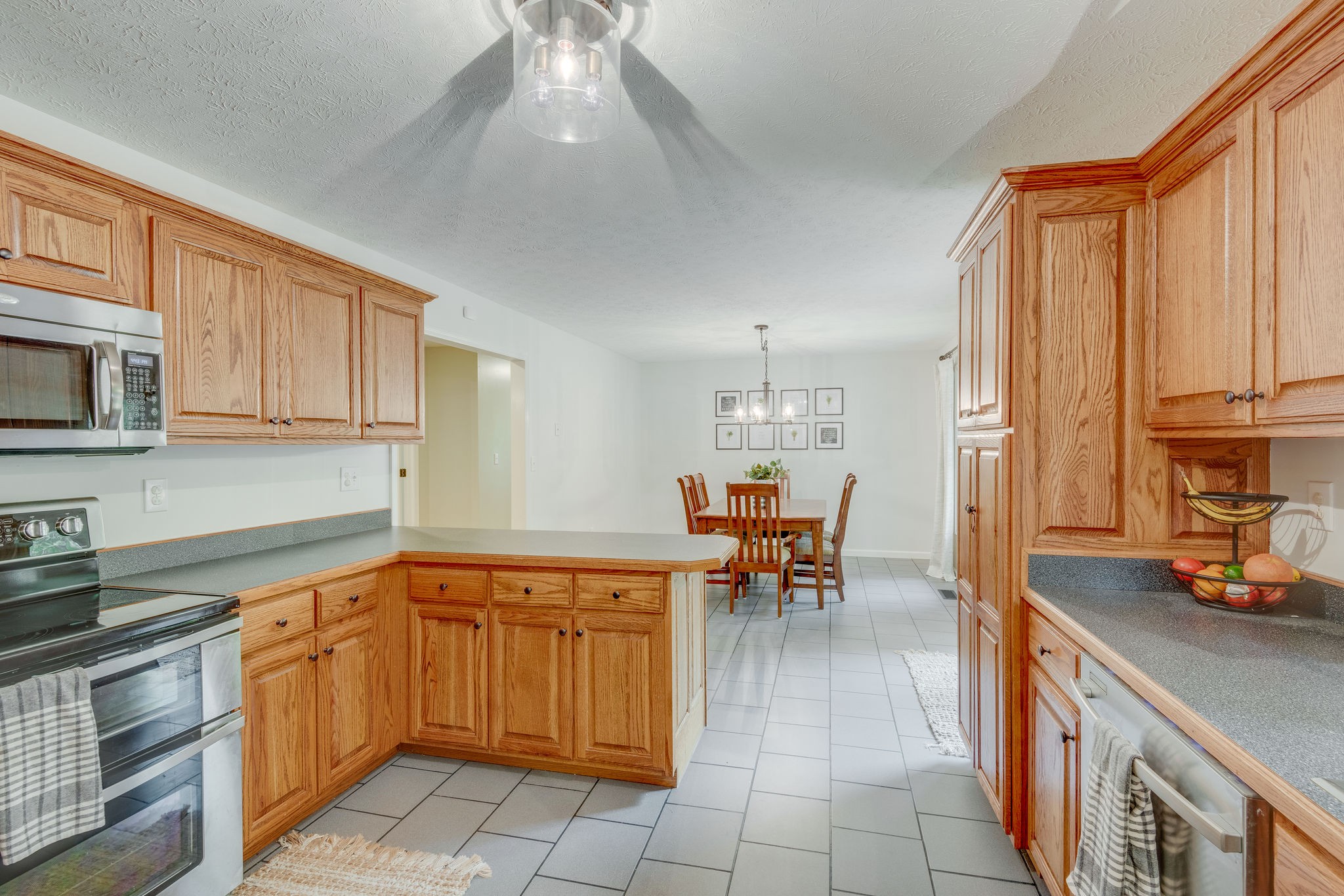 770 Iron Hill Road Burns, TN 37029 - Photo 11 of 28 a kitchen with a table chairs sink and cabinets