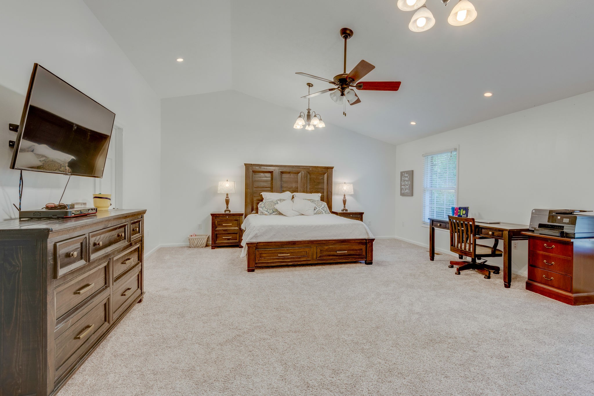 770 Iron Hill Road Burns, TN 37029 - Photo 16 of 28 a bedroom with furniture and a flat screen tv