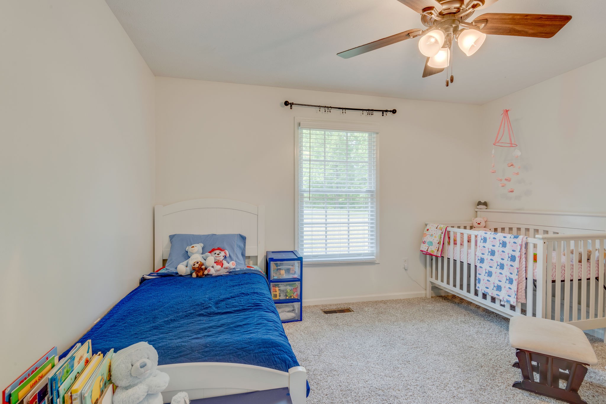 770 Iron Hill Road Burns, TN 37029 - Photo 24 of 28 a bed room with furniture and a window