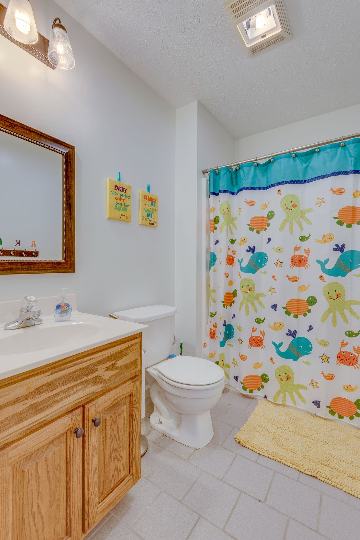 770 Iron Hill Road Burns, TN 37029 - Photo 25 of 28 a bathroom with a sink toilet and a mirror