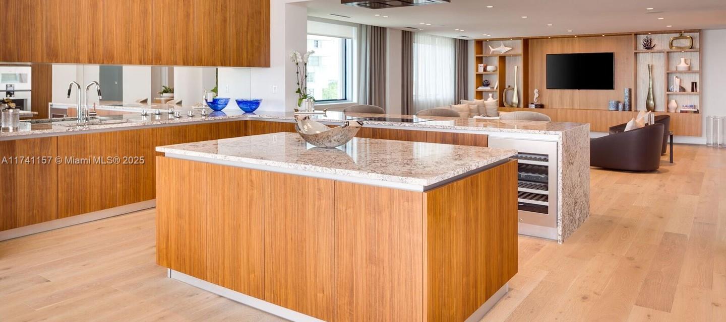 175 Southeast 25th Road, Unit 2802 Miami, FL 33129 - Photo 28 of 32 a kitchen with stainless steel appliances granite countertop a sink and a microwave