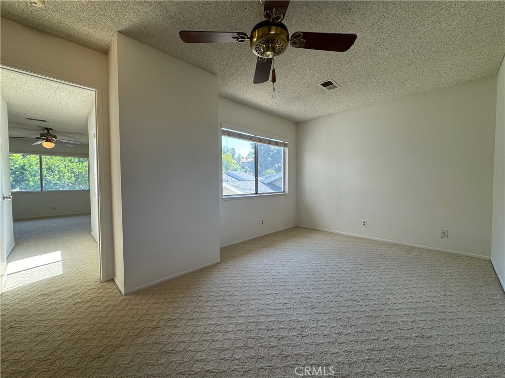 1819 Molokai Street West Covina, CA 91792 - Photo 14 of 25 an empty room with a empty space and windows