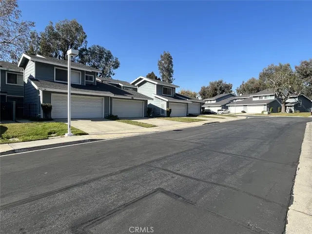 a view of a house with a street