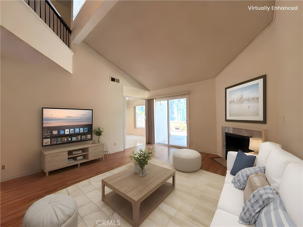 1819 Molokai Street West Covina, CA 91792 - Photo 2 of 25 a living room with furniture and a flat screen tv