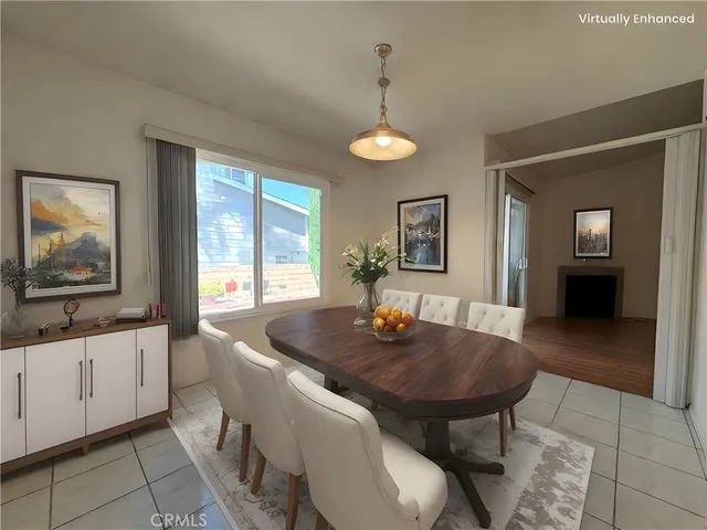 a view of a dining room with furniture and window
