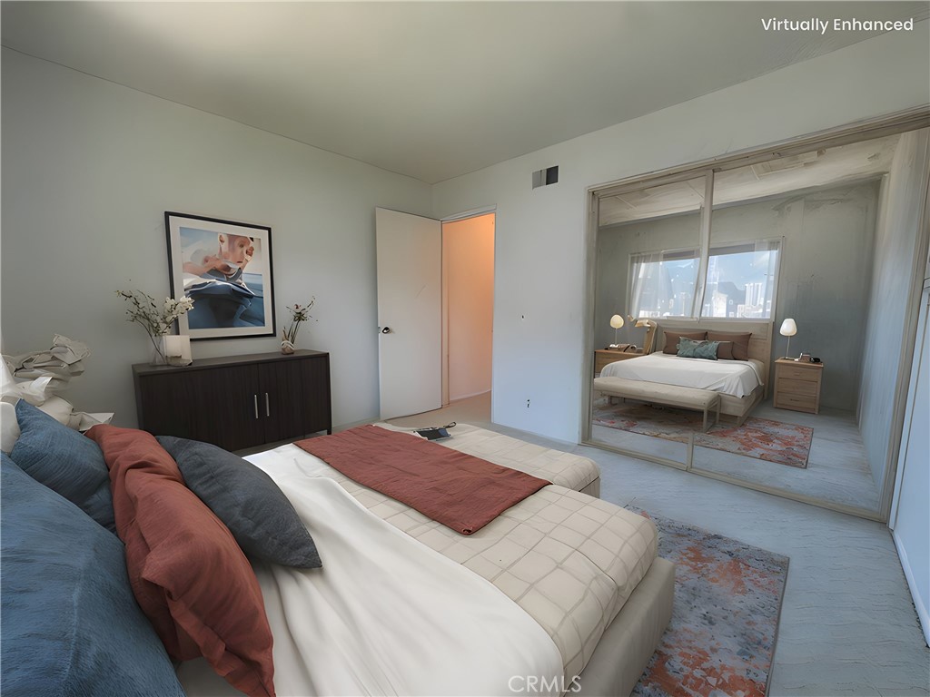 1819 Molokai Street West Covina, CA 91792 - Photo 7 of 25 a bedroom with a bed and a mirror