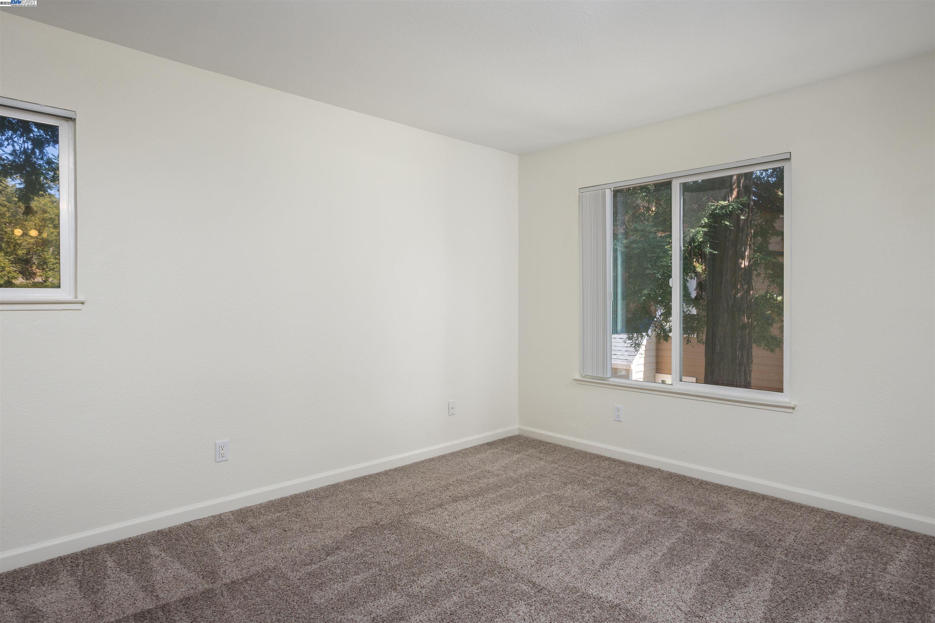 140 Reflections Drive, Unit 24 San Ramon, CA 94583 - Photo 14 of 32 an empty room with a window