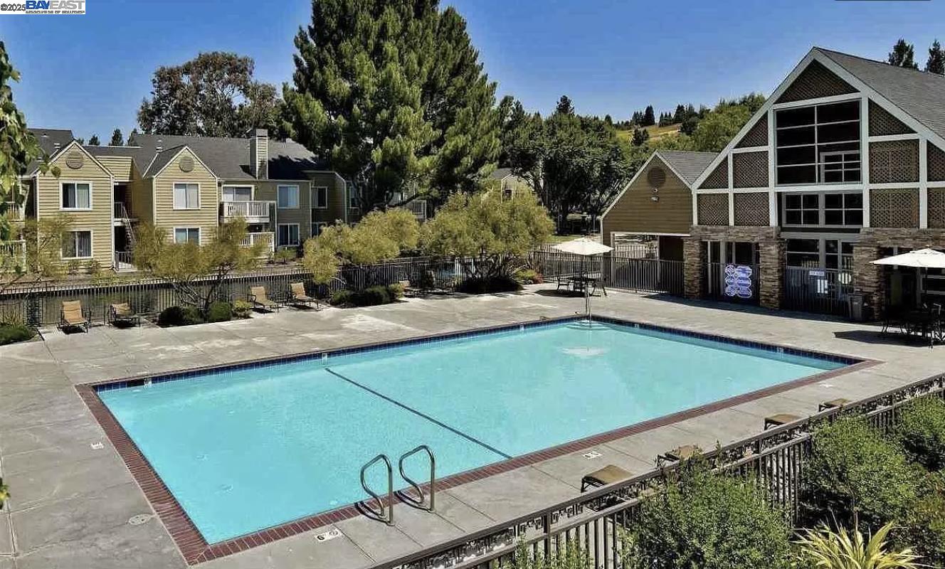 140 Reflections Drive, Unit 24 San Ramon, CA 94583 - Photo 21 of 32 a view of a house with a backyard and sitting area