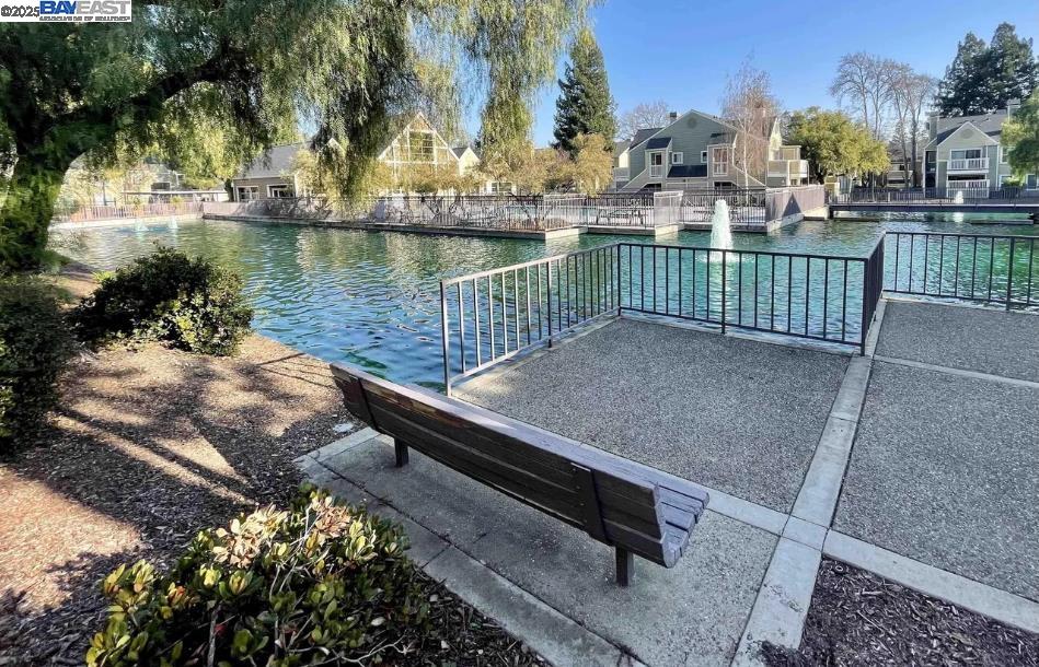 140 Reflections Drive, Unit 24 San Ramon, CA 94583 - Photo 23 of 32 a view of a lake with a deck