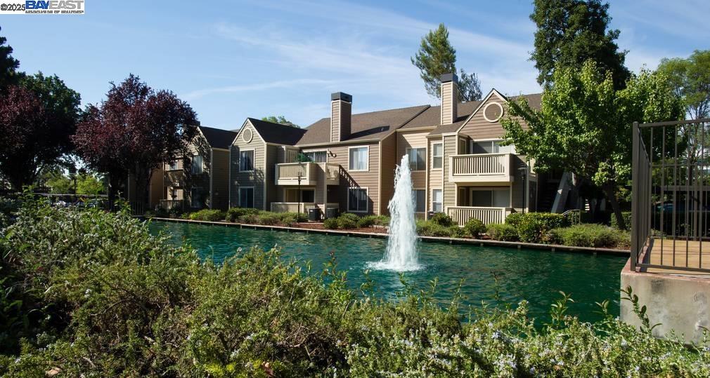 140 Reflections Drive, Unit 24 San Ramon, CA 94583 - Photo 27 of 32 a front view of a house with garden