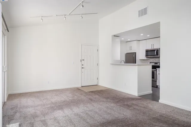 a view of a kitchen with a sink