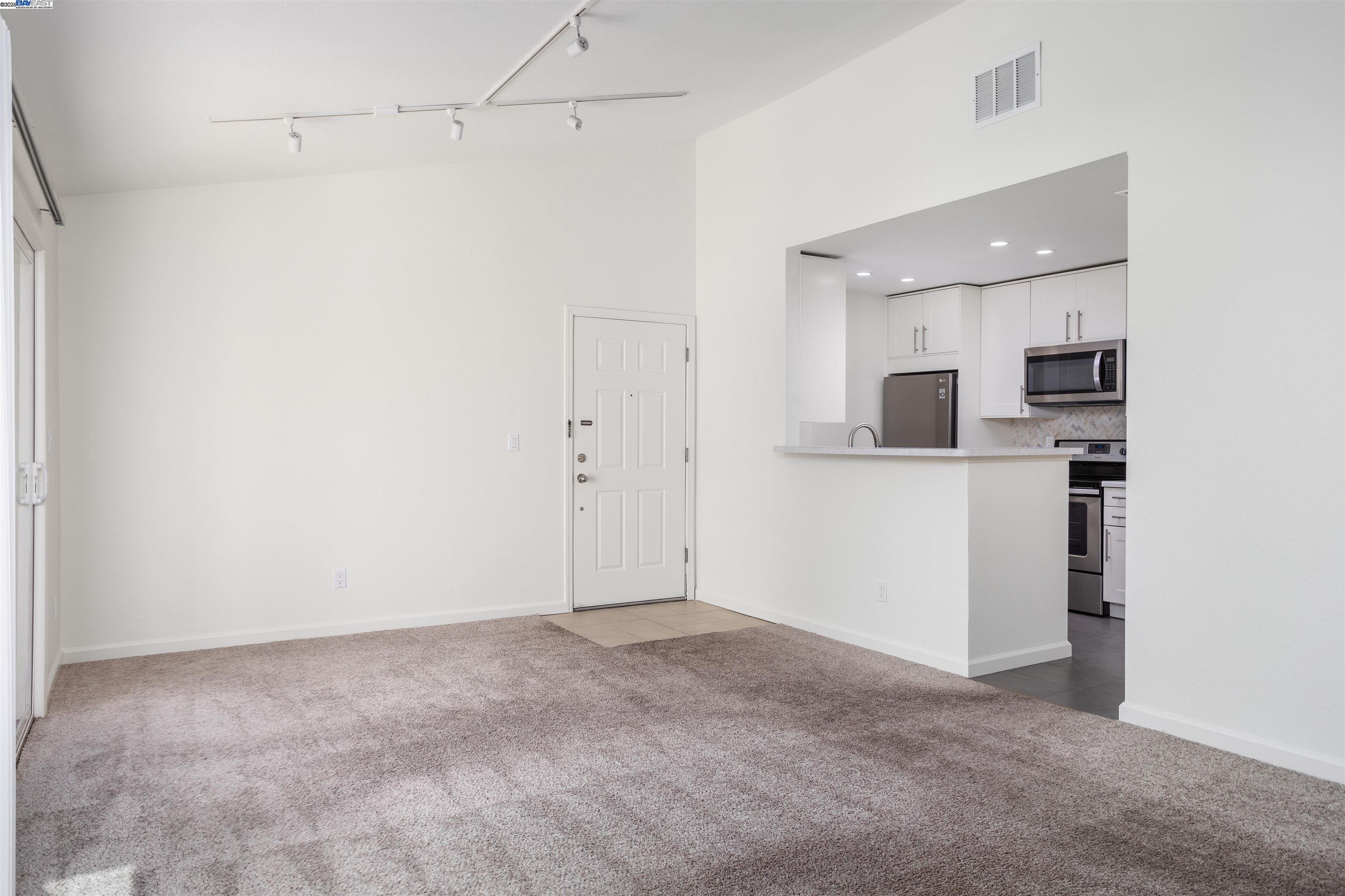 140 Reflections Drive, Unit 24 San Ramon, CA 94583 - Photo 3 of 32 a view of a kitchen with a sink