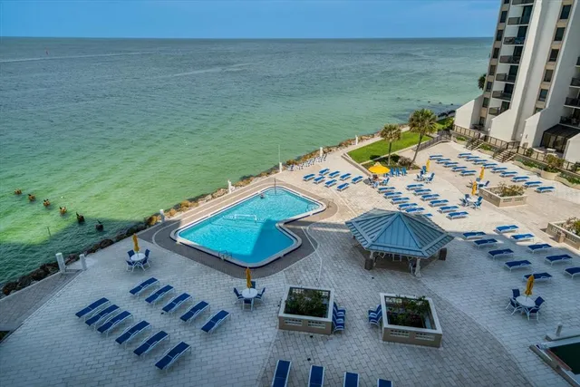 a view of swimming pool yard from a terrace