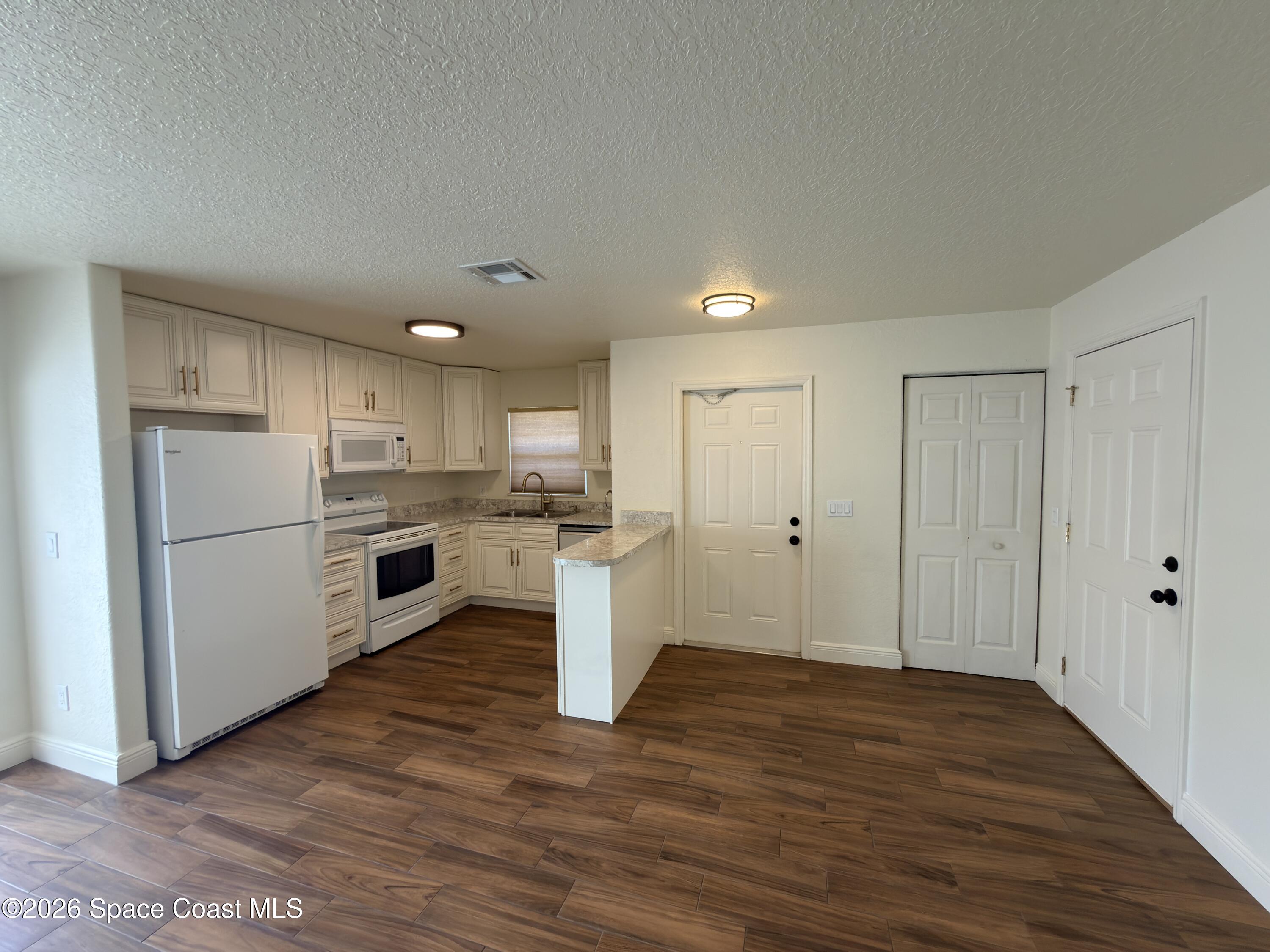 1914 Fletcher Street Melbourne, FL 32901 - Photo 7 of 20 20260429_185434511_iOS