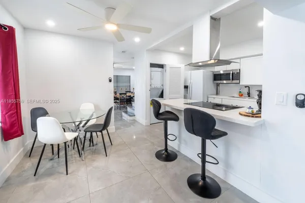 a view of a dining room with furniture