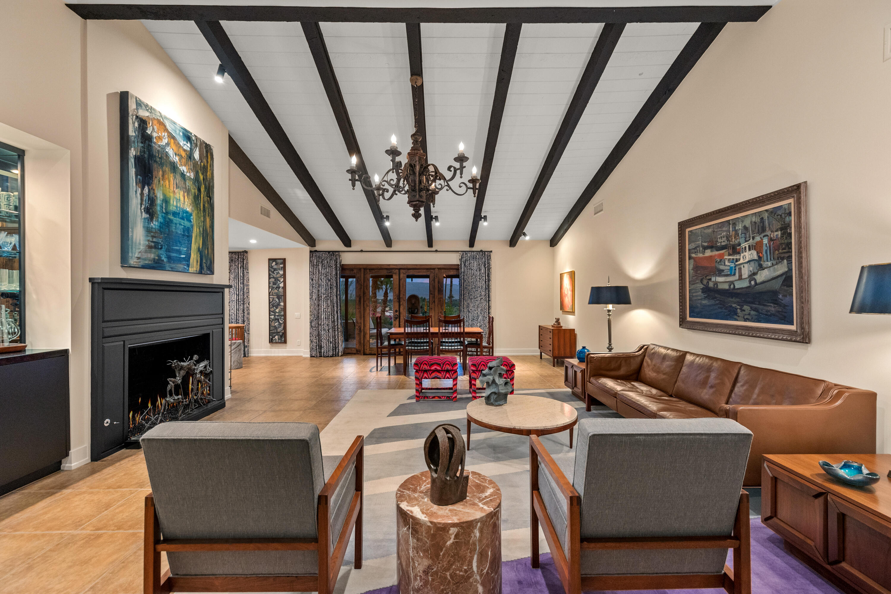 40170 Paseo Lindo Rancho Mirage, CA 92270 - Photo 12 of 51 a living room with furniture fireplace and flat screen tv