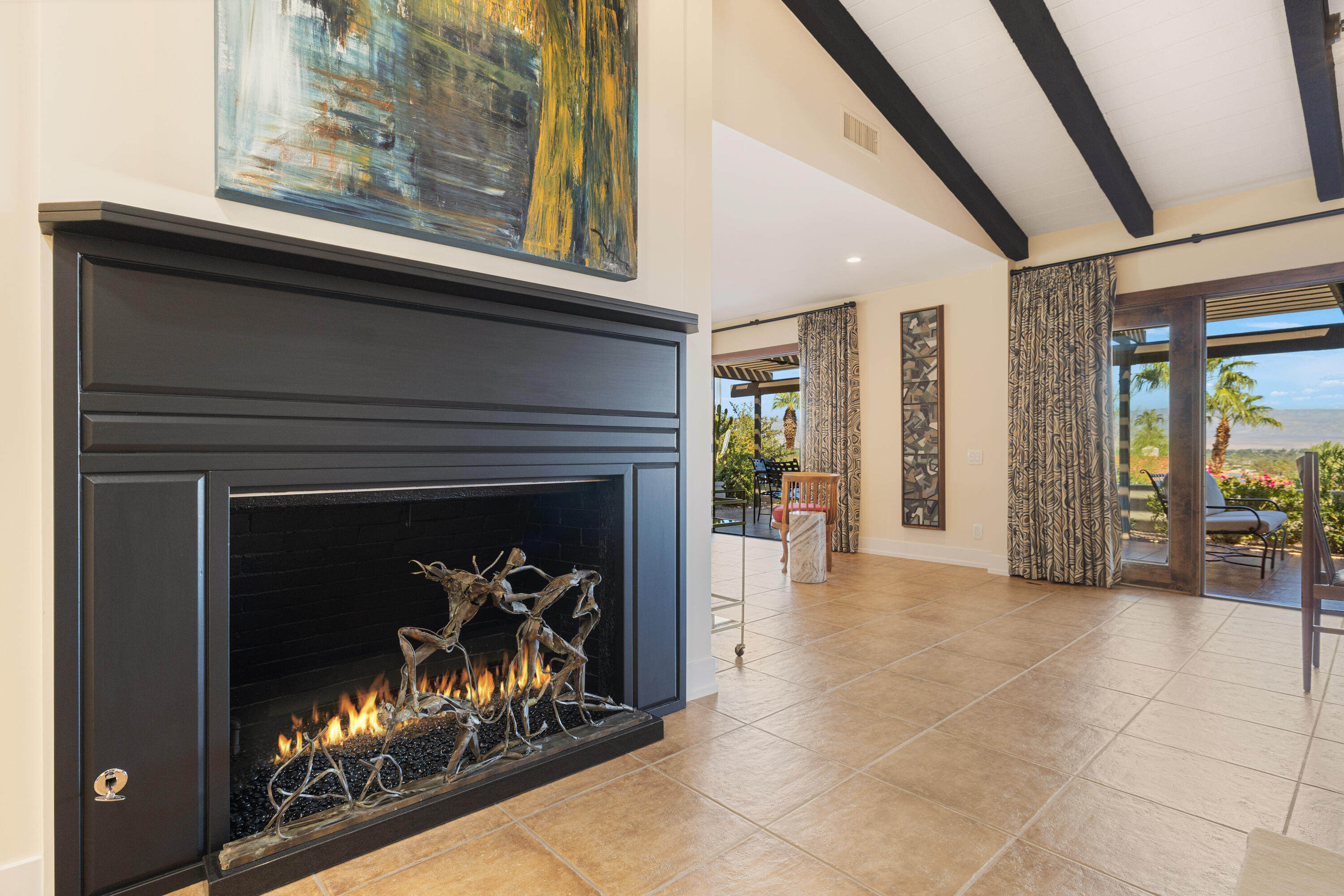 40170 Paseo Lindo Rancho Mirage, CA 92270 - Photo 17 of 51 a view of an empty room with fireplace and a window