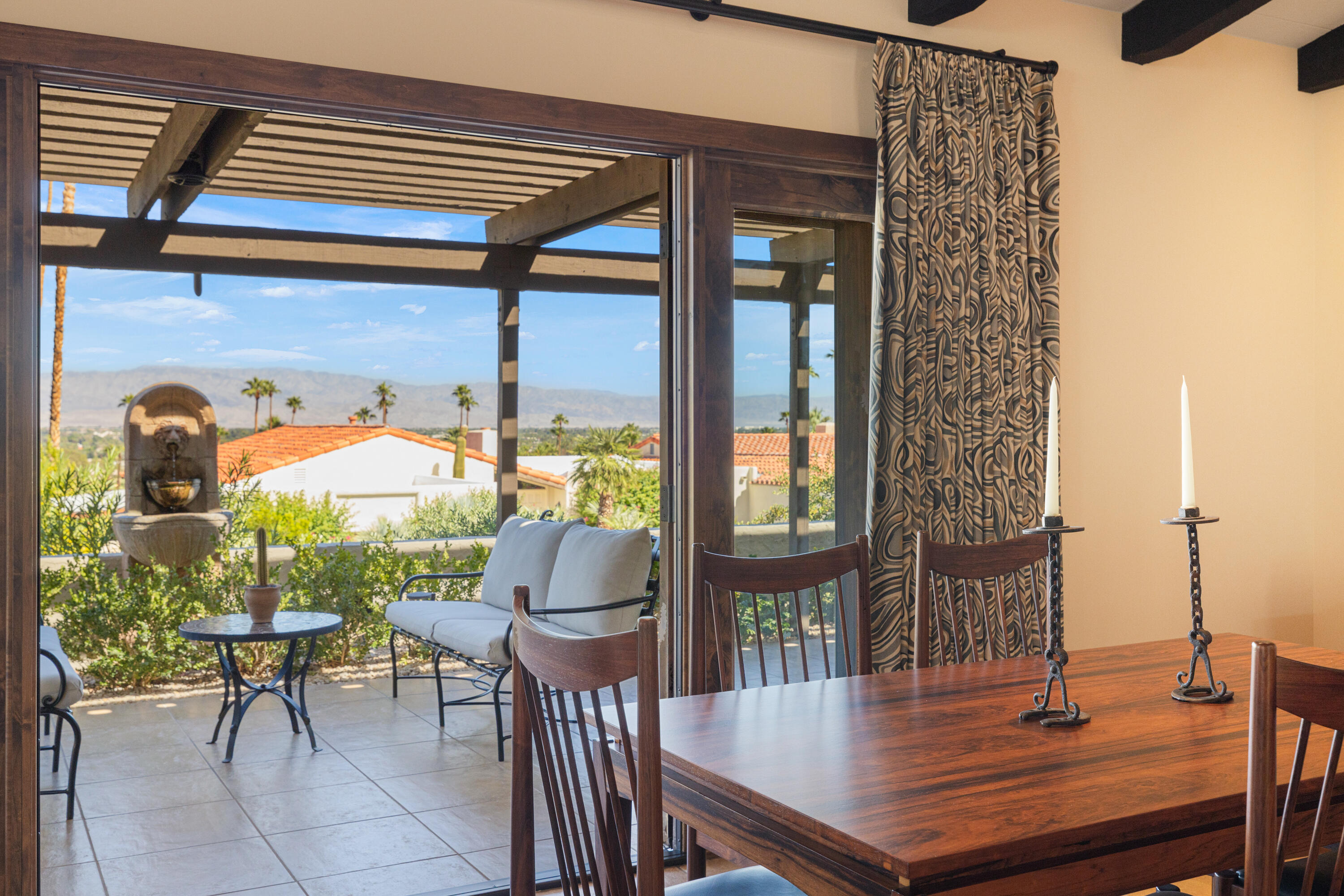40170 Paseo Lindo Rancho Mirage, CA 92270 - Photo 19 of 51 a view of balcony with two chairs and a table