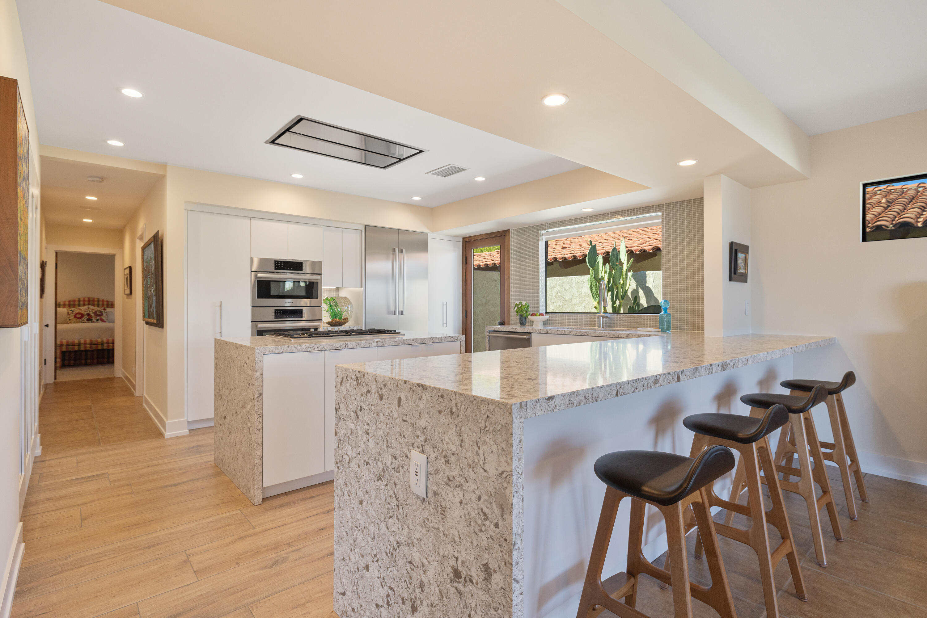 40170 Paseo Lindo Rancho Mirage, CA 92270 - Photo 22 of 51 a view of kitchen and dining area with a sink