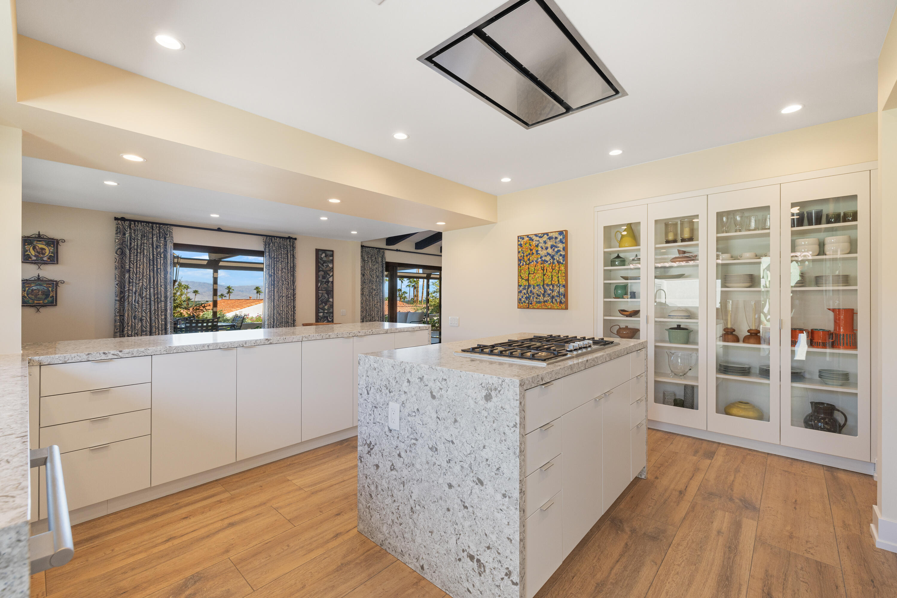 40170 Paseo Lindo Rancho Mirage, CA 92270 - Photo 24 of 51 a kitchen with stainless steel appliances granite countertop a stove and a refrigerator