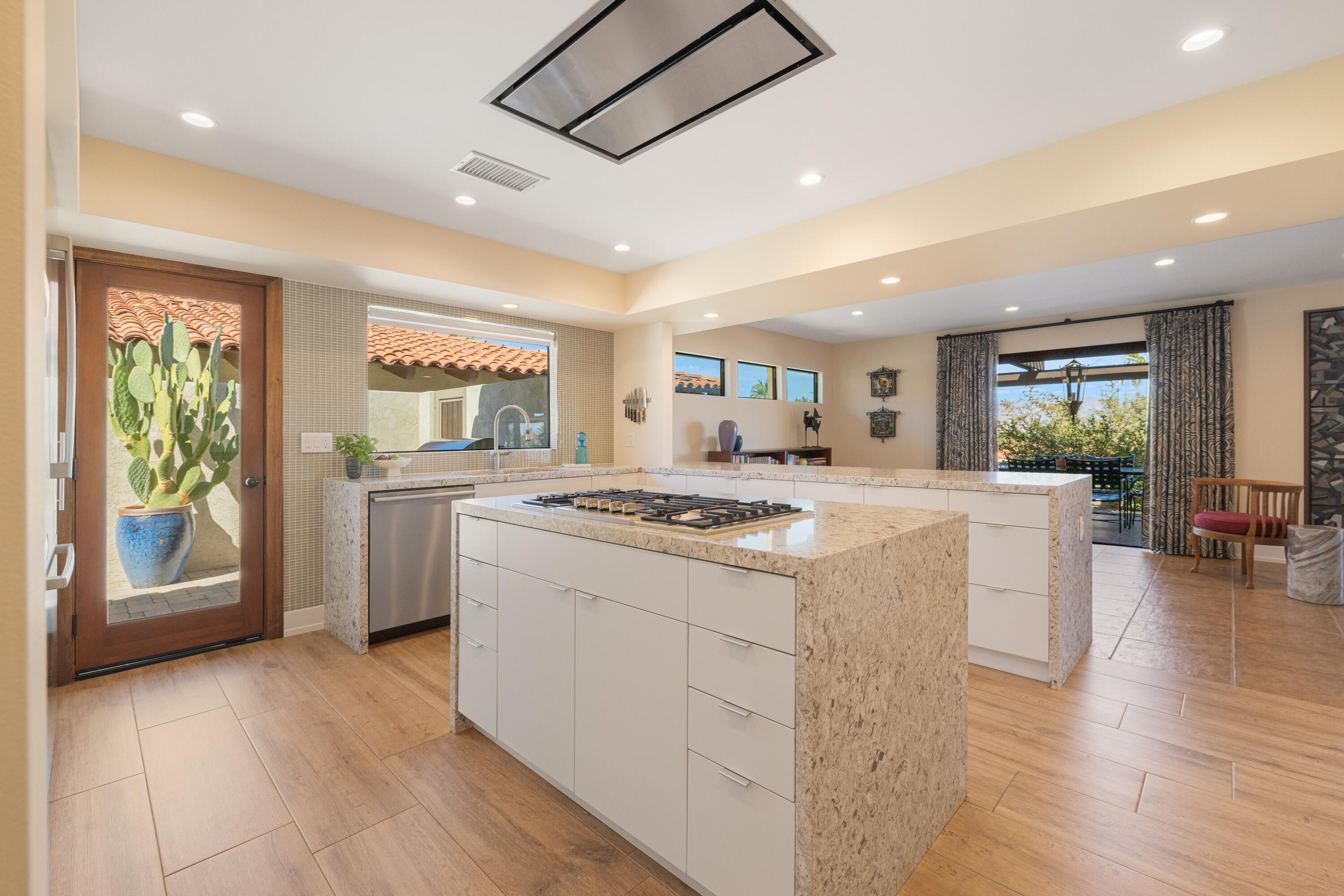 40170 Paseo Lindo Rancho Mirage, CA 92270 - Photo 3 of 51 a kitchen with stove and wooden floor