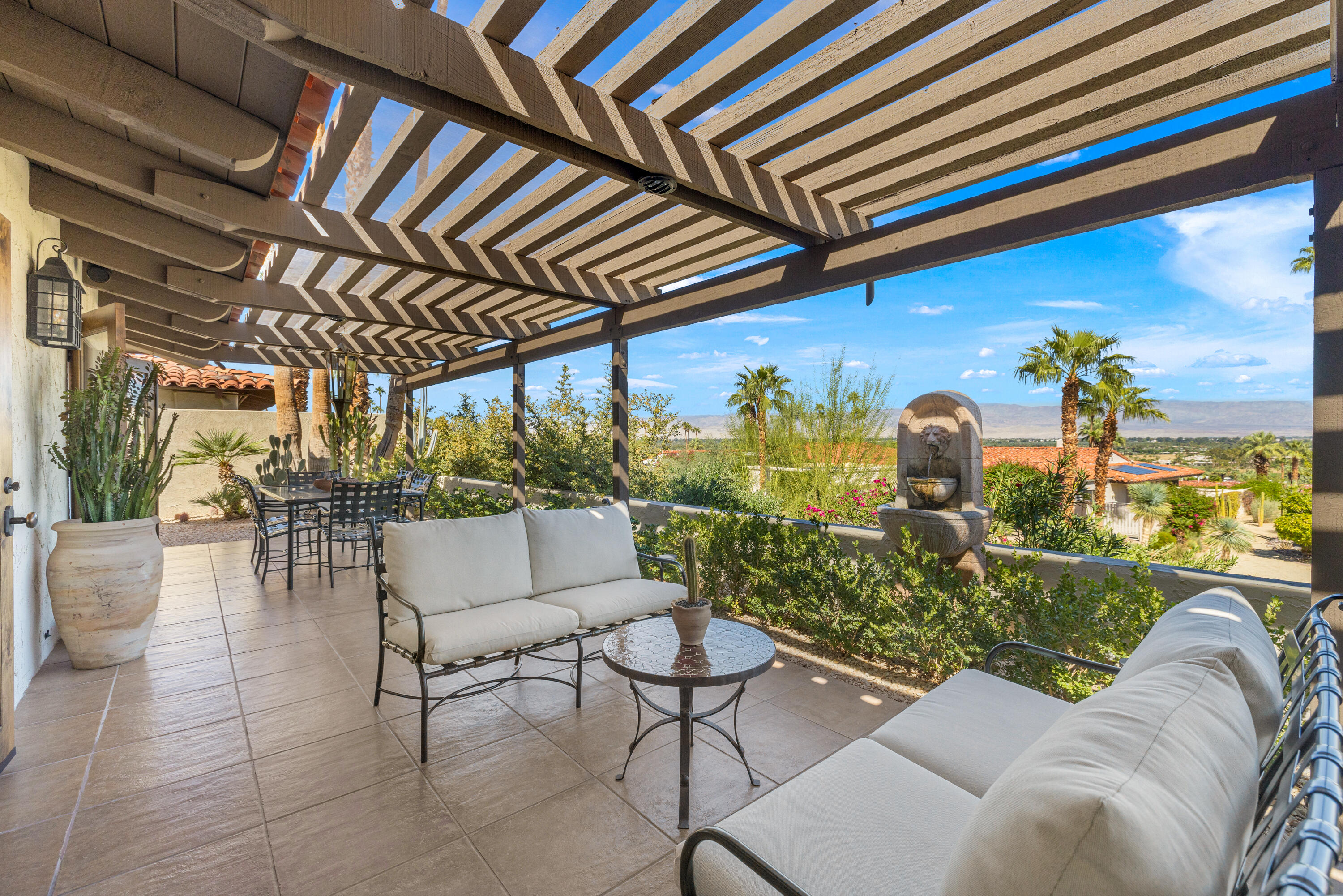 40170 Paseo Lindo Rancho Mirage, CA 92270 - Photo 32 of 51 a outdoor living space with furniture and garden view