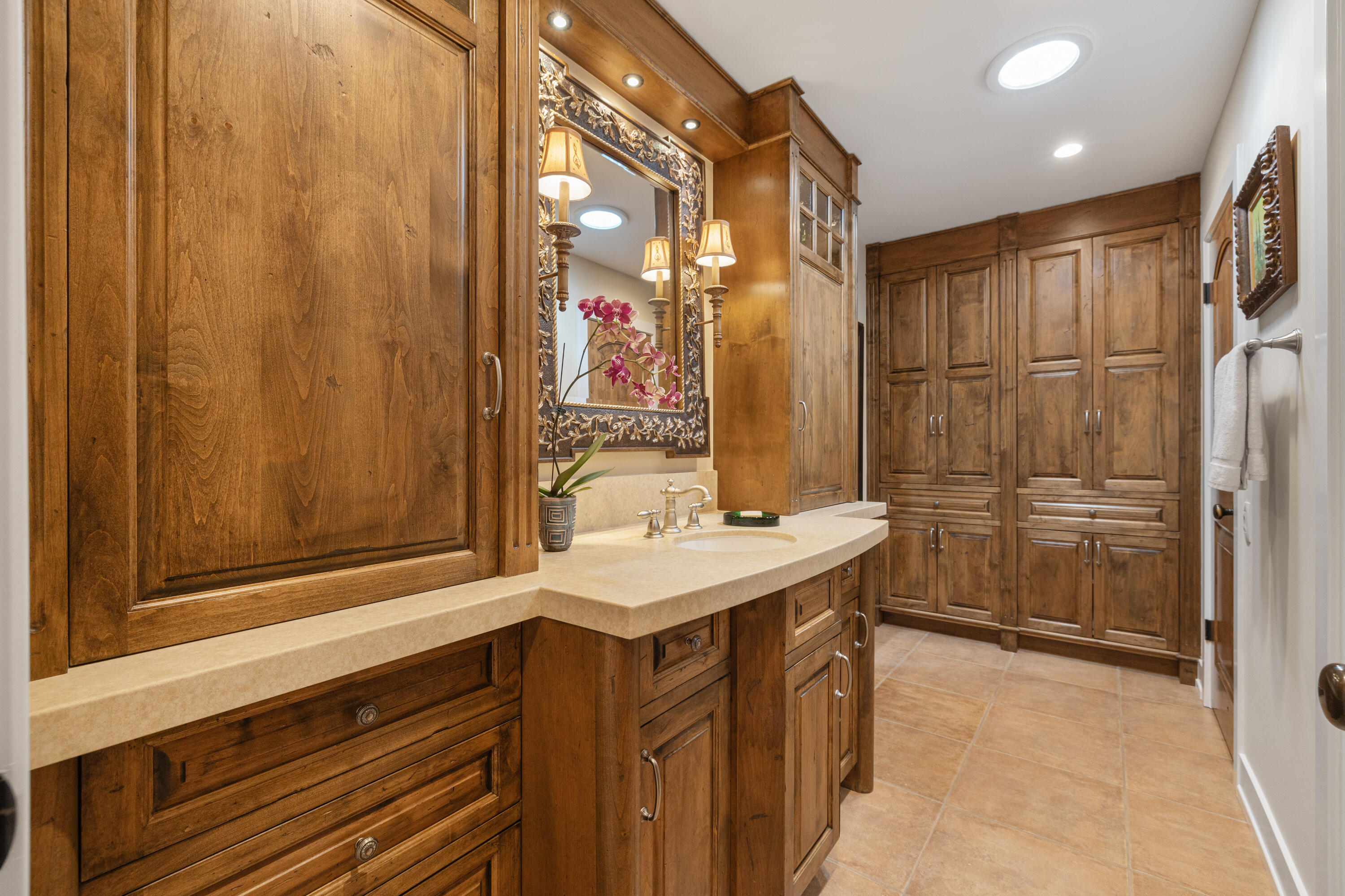 40170 Paseo Lindo Rancho Mirage, CA 92270 - Photo 37 of 51 a bathroom with a sink a mirror and a shower