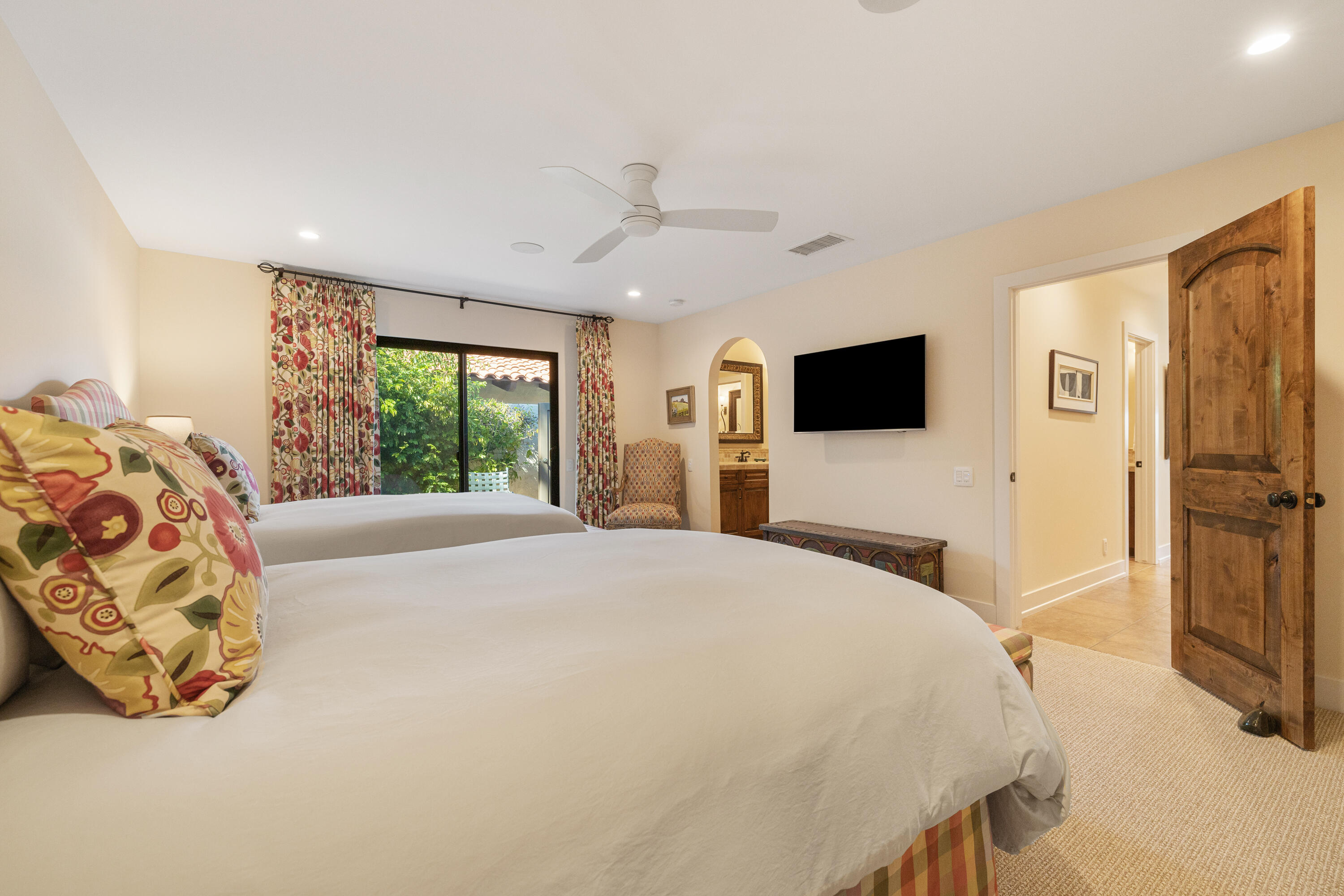 40170 Paseo Lindo Rancho Mirage, CA 92270 - Photo 43 of 51 a bedroom with a bed and a flat screen tv