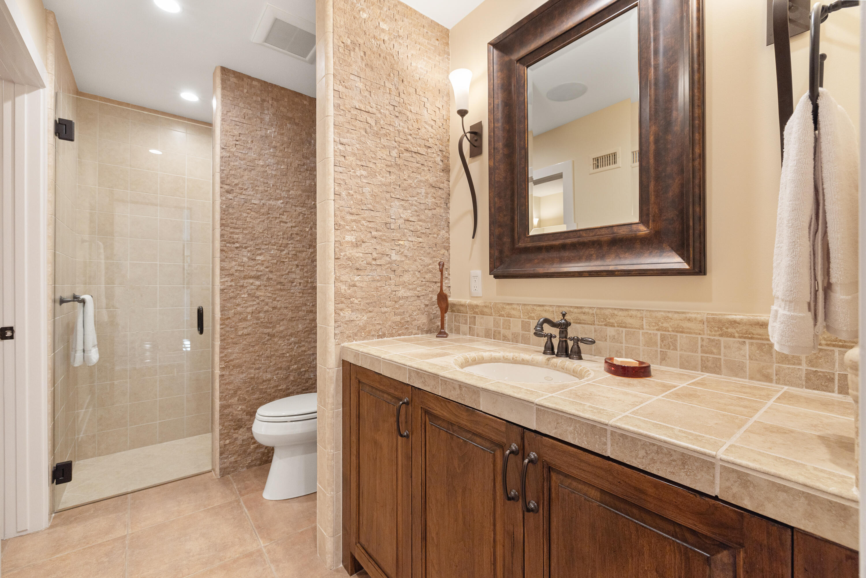 40170 Paseo Lindo Rancho Mirage, CA 92270 - Photo 44 of 51 a bathroom with a sink a toilet and shower