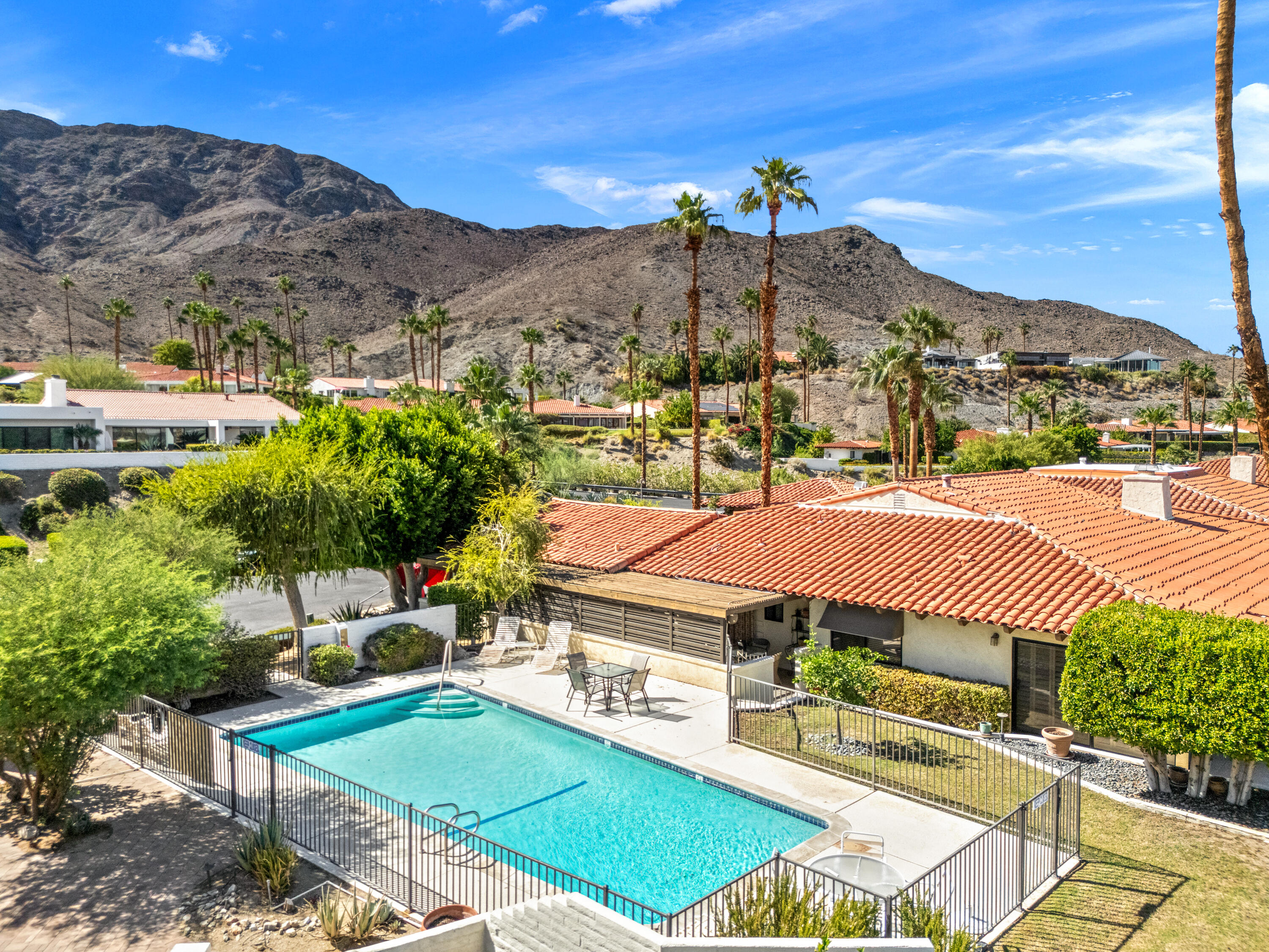 40170 Paseo Lindo Rancho Mirage, CA 92270 - Photo 47 of 51 a view of a terrace with a table and chairs