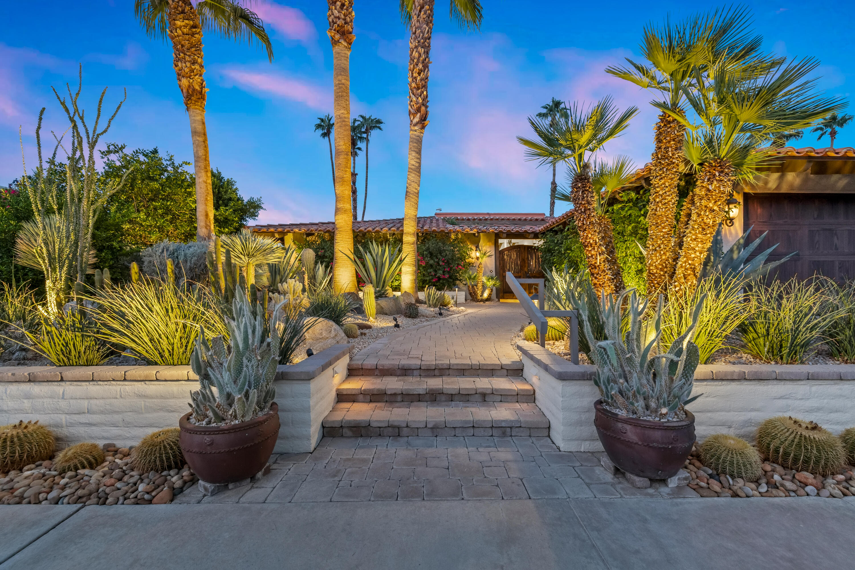 40170 Paseo Lindo Rancho Mirage, CA 92270 - Photo 50 of 51 a view of a garden with potted plants