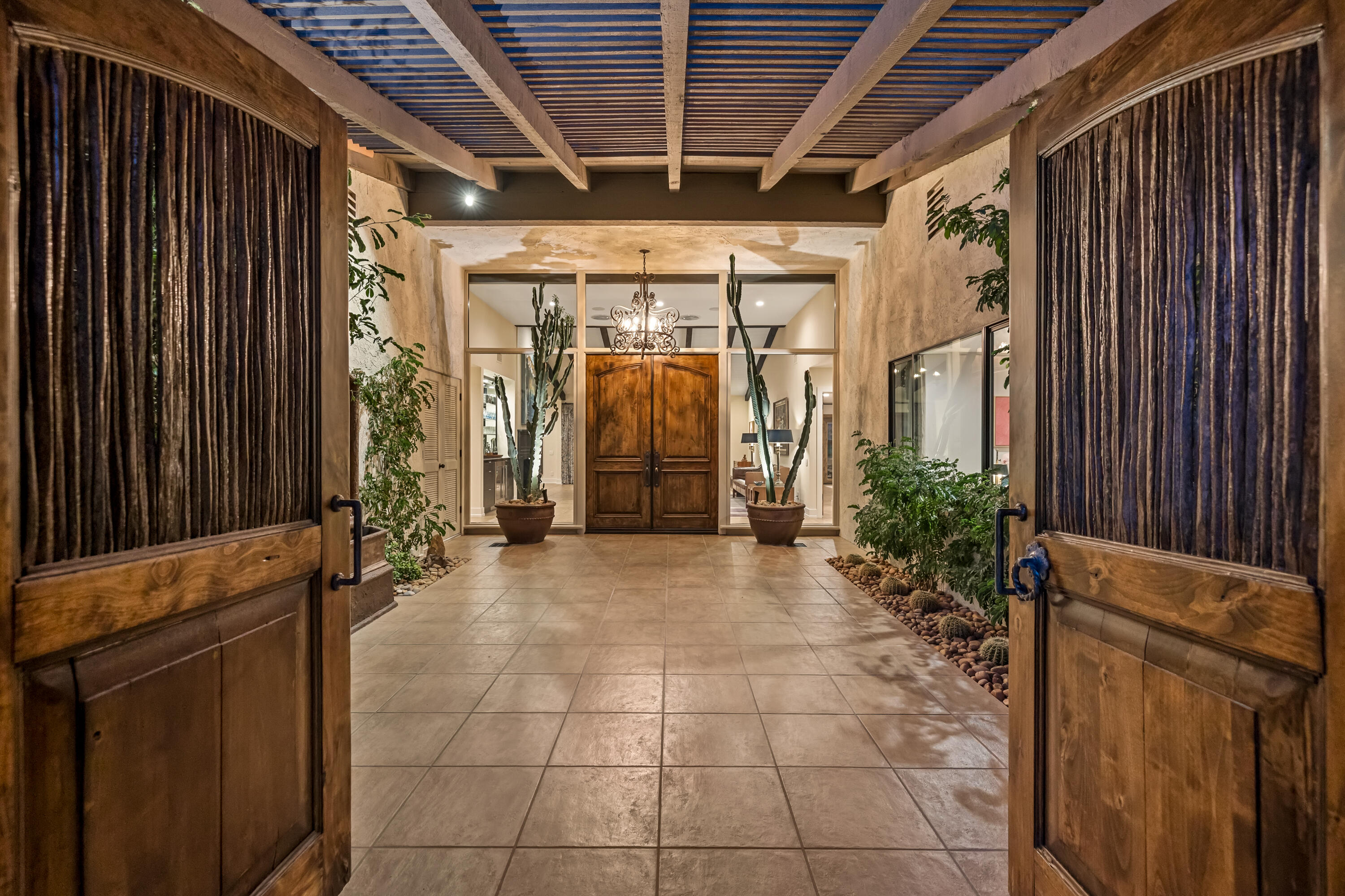 40170 Paseo Lindo Rancho Mirage, CA 92270 - Photo 9 of 51 a view of a porch with furniture and shower
