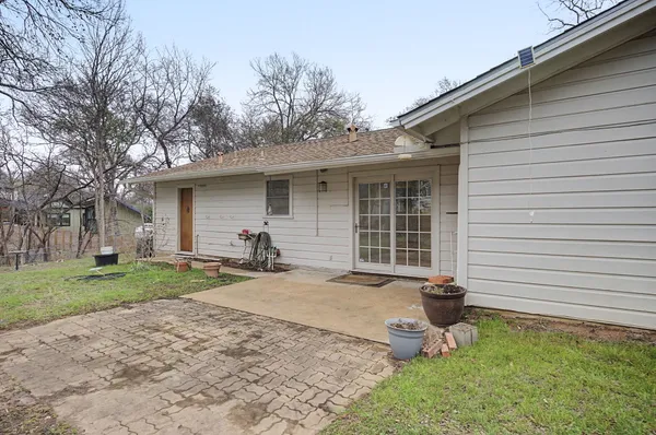 a house view with a backyard space