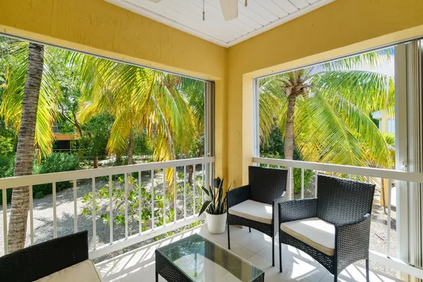 a view of a two chair in the balcony