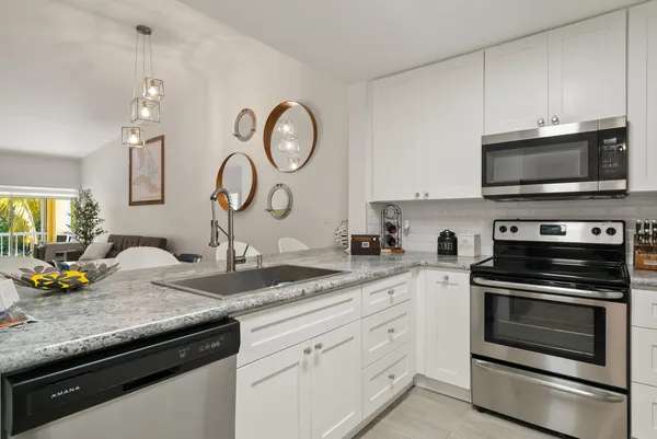 a bathroom with a shower and a shower curtain