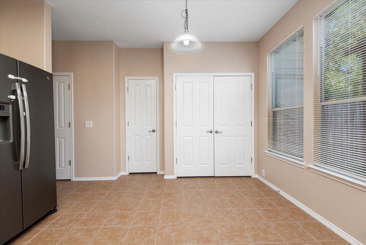 23611 Youpon Lake Lane Spring, TX 77373 - Photo 13 of 25 a view of an empty room with a window