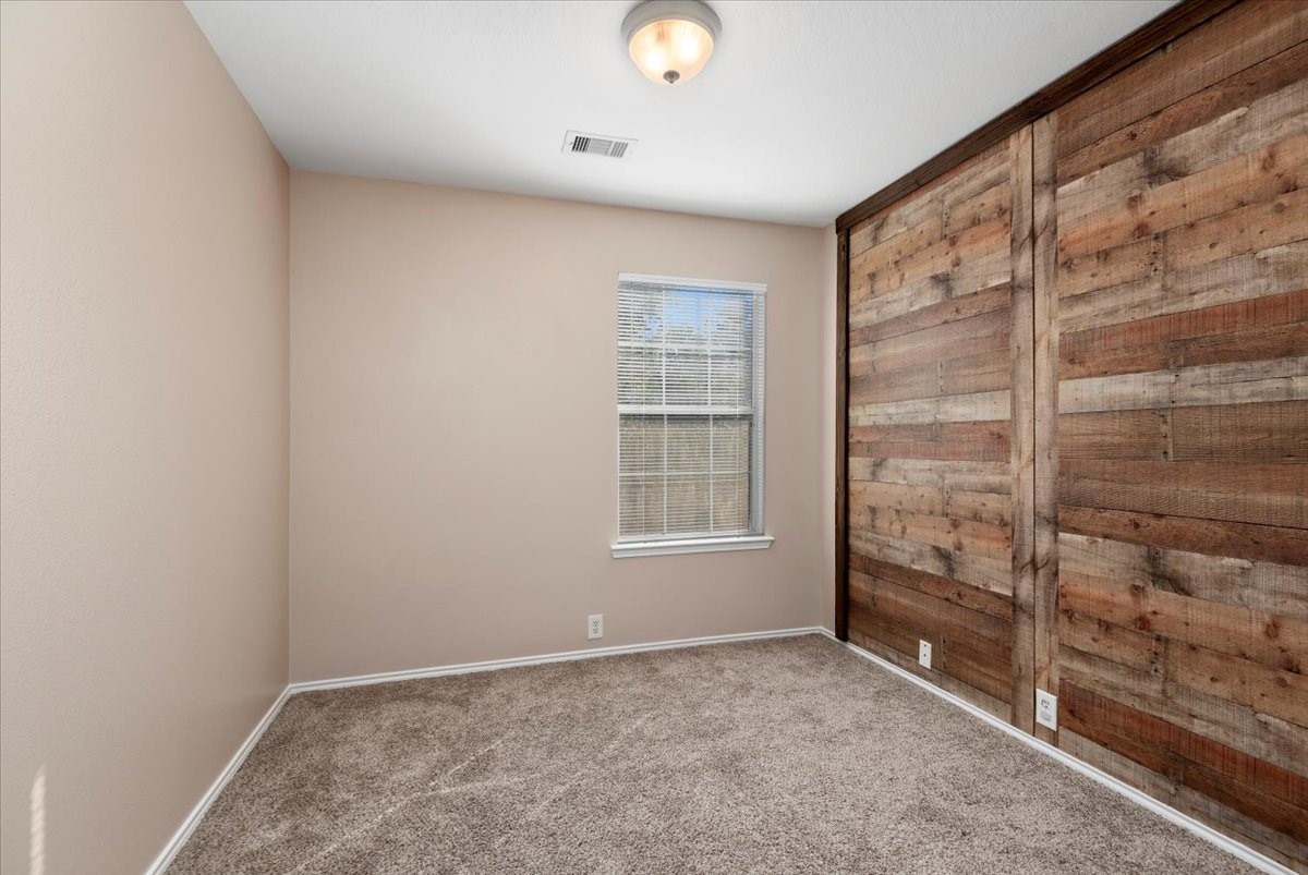 23611 Youpon Lake Lane Spring, TX 77373 - Photo 20 of 25 a view of an empty room with a window