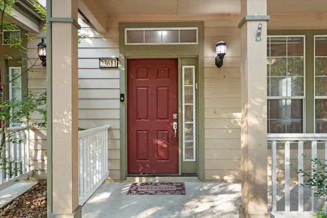 a front view of a house with a glass door