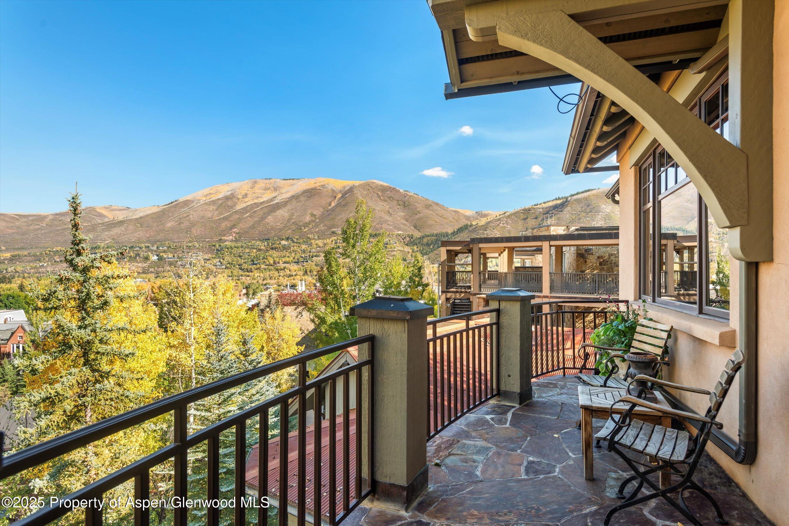 Aspen Central Core Aspen, CO 81611 - Photo 16 of 26 a view of a balcony with chairs