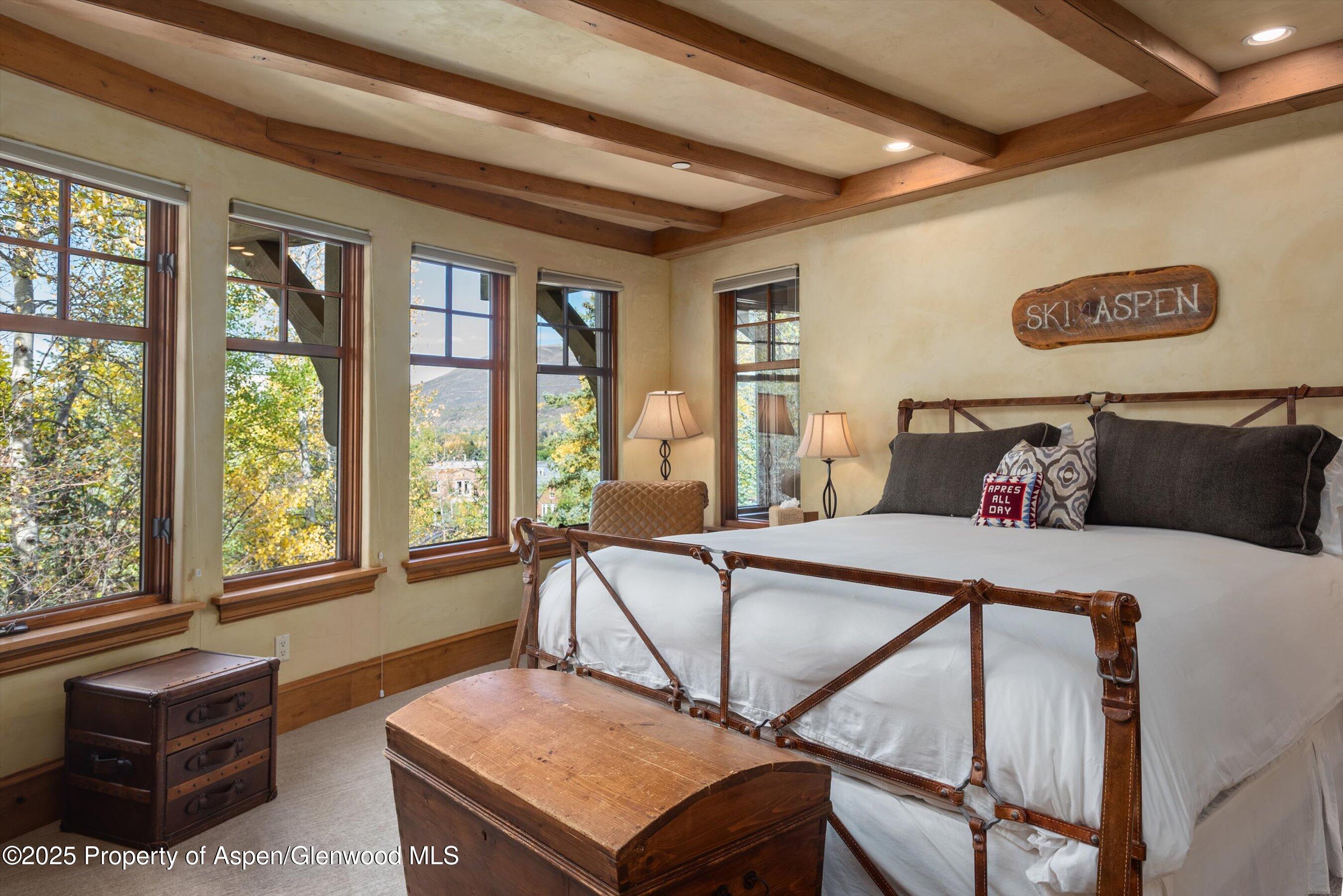 Aspen Central Core Aspen, CO 81611 - Photo 10 of 26 a living room with furniture and a floor to ceiling window