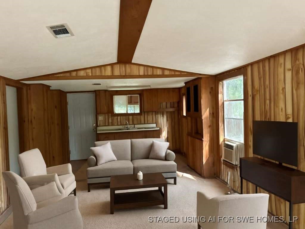 110 Stewart Street Coldspring, TX 77331 - Photo 5 of 12 a living room with furniture a ceiling fan and a window