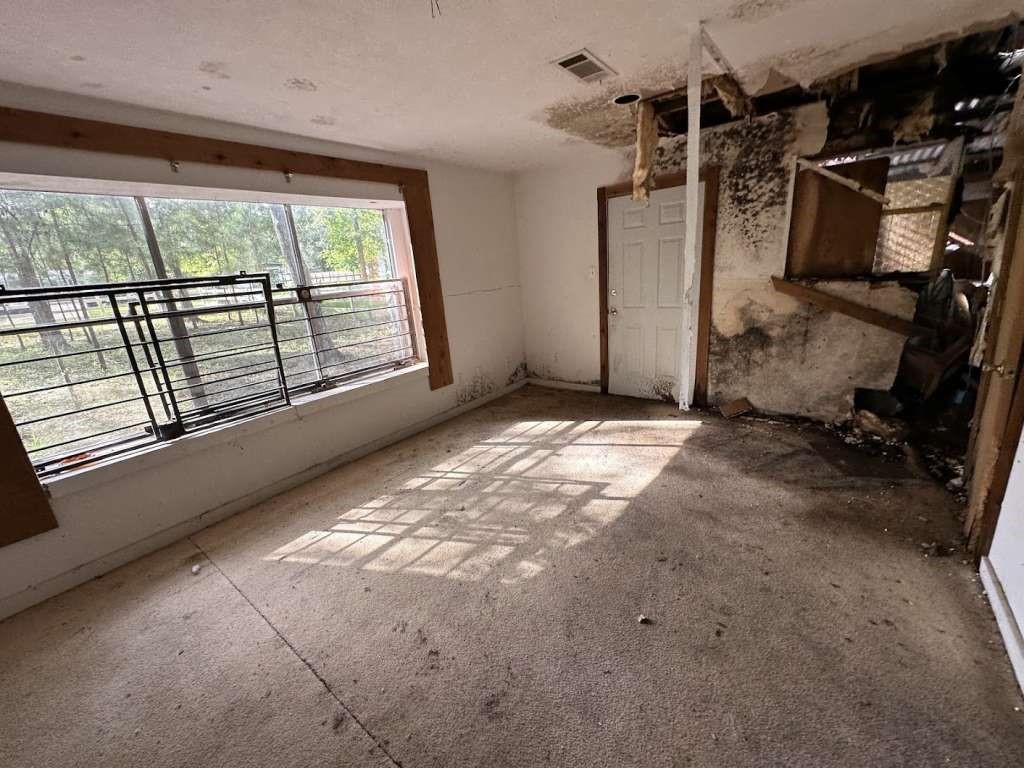 110 Stewart Street Coldspring, TX 77331 - Photo 10 of 12 a view of a room with a large window