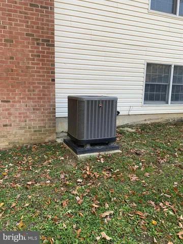 a view of a backyard with a small cabin